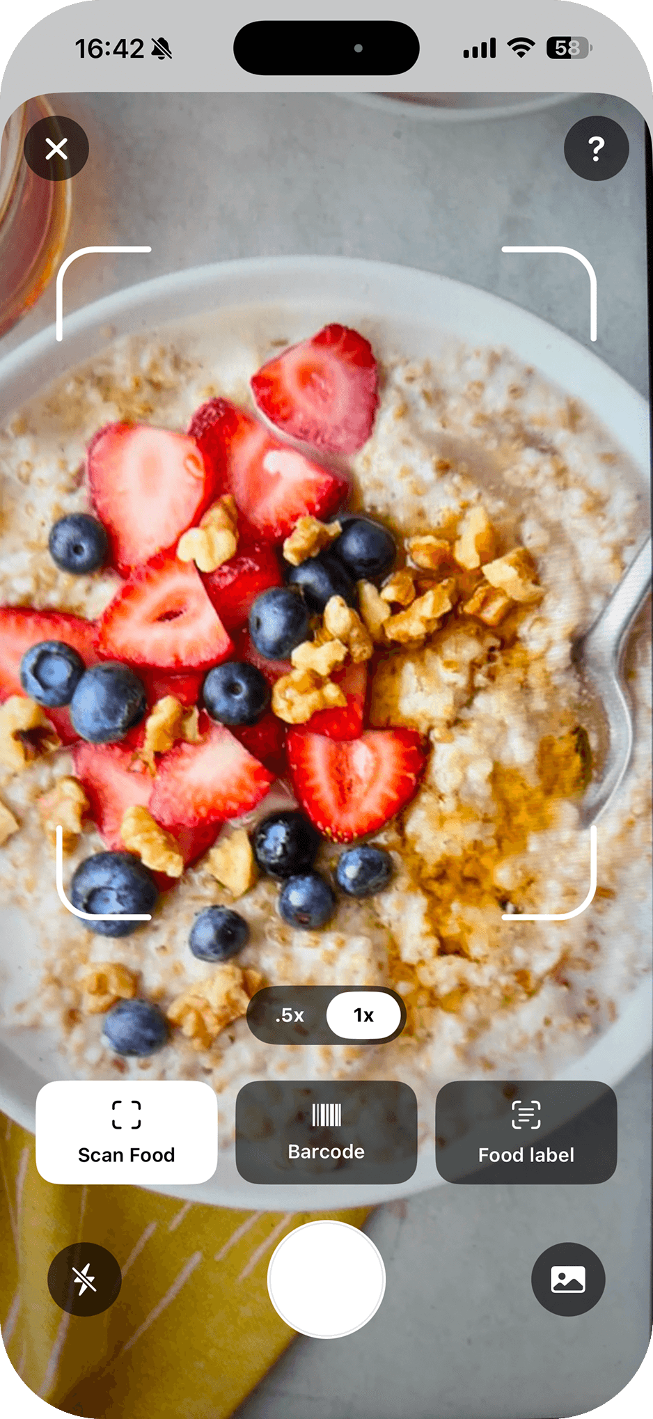 AI food scanner viewfinder framing a breakfast bowl